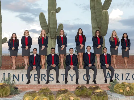 Group photo of students at University of Arizona sign