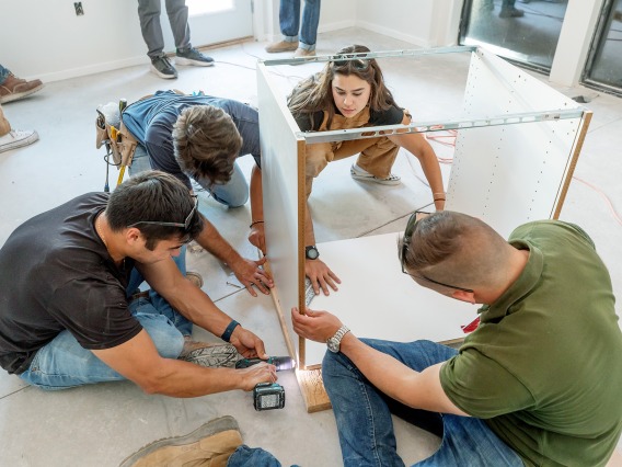 Students building furniture