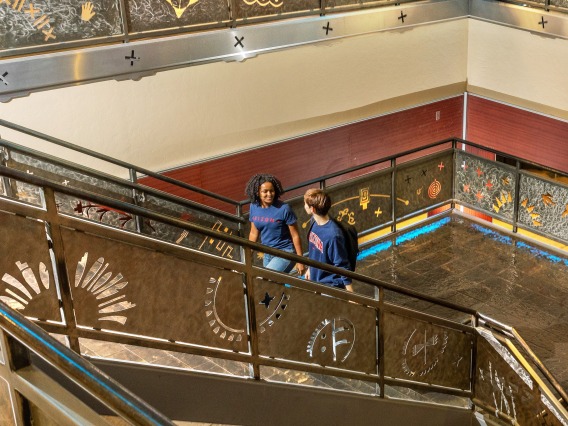 Students walking up staircase
