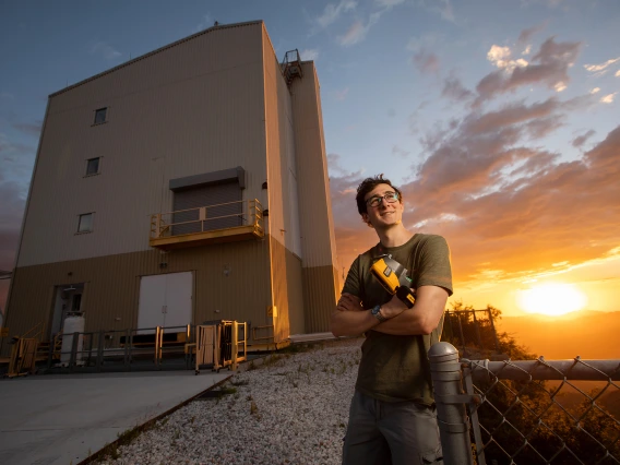 Student standing in front of a building