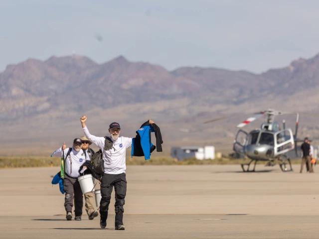 Dante Lauretta, principal investigator for NASA’s Wildcat-led OSIRIS-REx mission, celebrates in the Utah desert after the historic Sept. 24 return of a sample of the asteroid Bennu. Before the mission, the United States had never returned an asteroid sample to Earth. Lauretta serves as a Regents Professor of planetary science and cosmochemistry at the University of Arizona. 