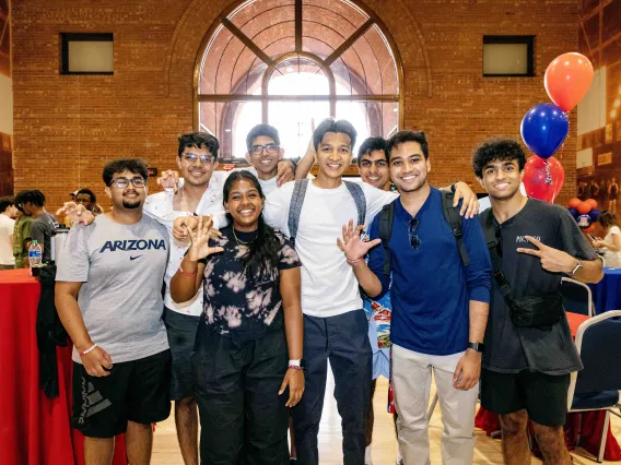 Students posing at luncheon