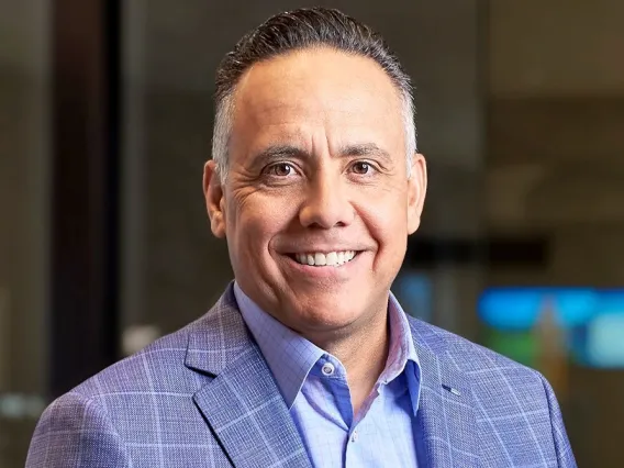 Portrait of man in business attire with soft focus background