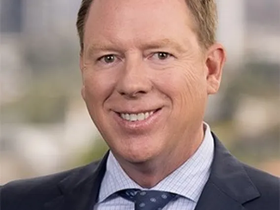 Portrait of man in business attire with soft focus background