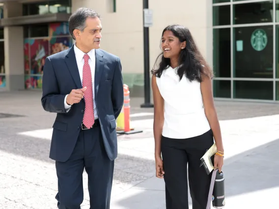 University of Arizona President, Suresh Garimella, walking and talking with Arizona Daily Wildcat reporter Kanishka Chinnaraj near the Student Union Memorial Center.