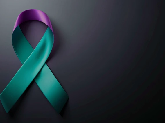 An image of the green and purple suicide prevention ribbon.