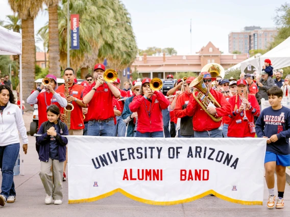 The University of Arizona Alumni Band playing down Old Main