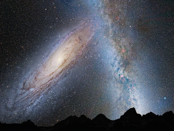 In this artist's illustration of Earth's night sky in 3.75 billion years, Andromeda fills the field of view and begins to distort the Milky Way with tidal pull.