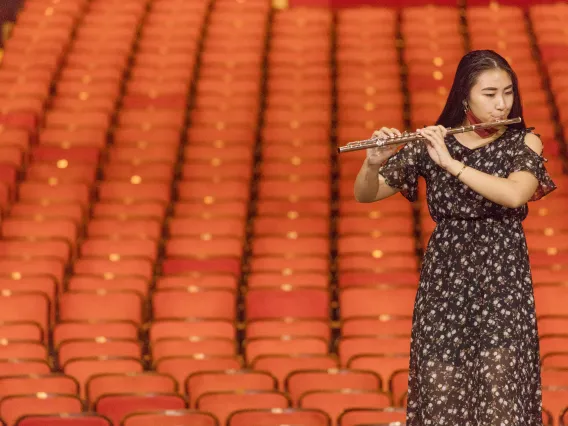 Student playing the flute