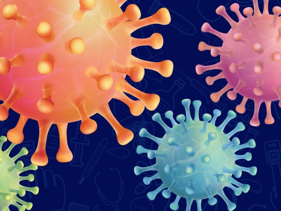 Animated photograph of the COVID-19 virus against a blue backdrop, printed with scientific materials.