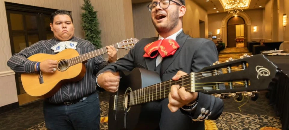 Guitarists playing and singing