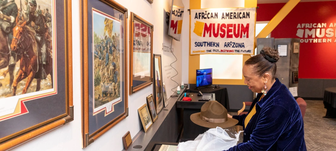 A photograph of guests learning at the African American Museum of Southern Arizona.