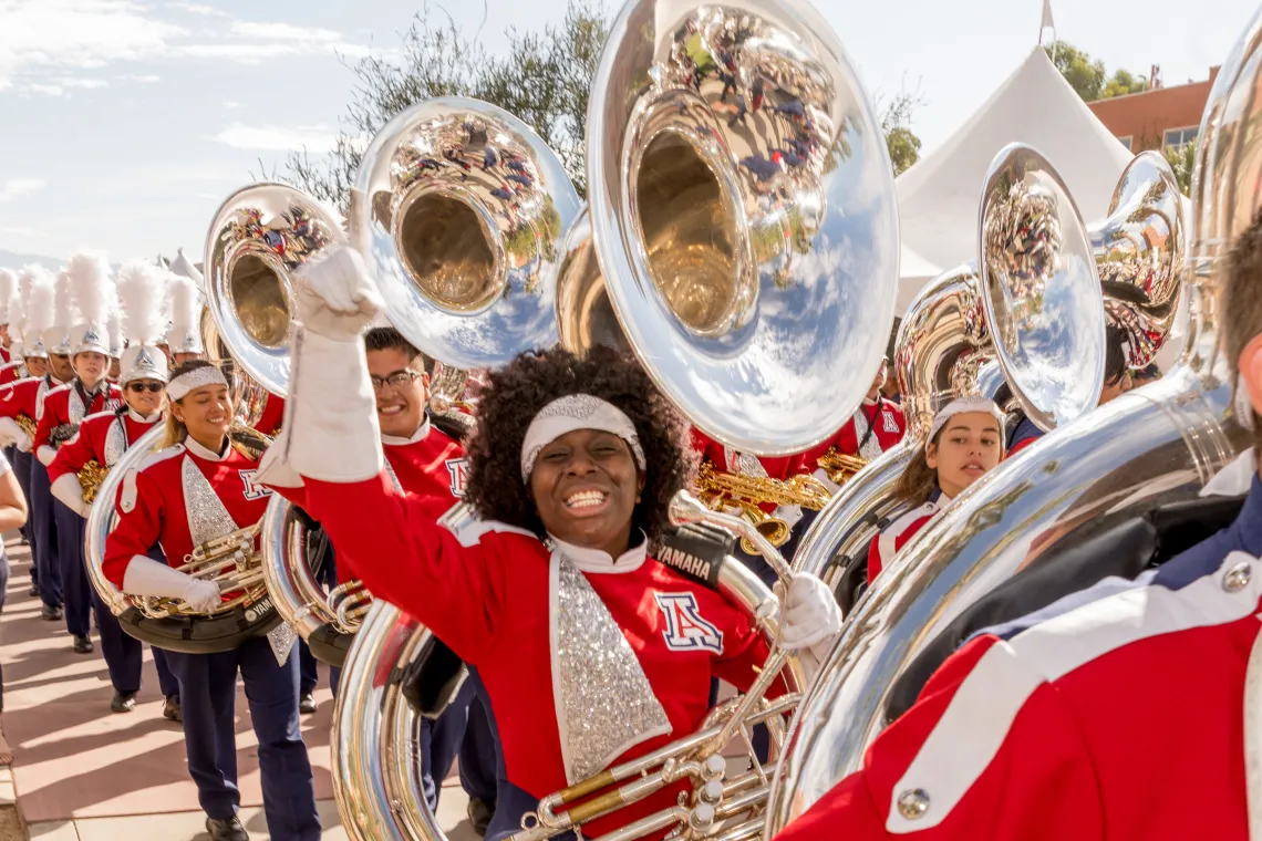 Tuba players marching