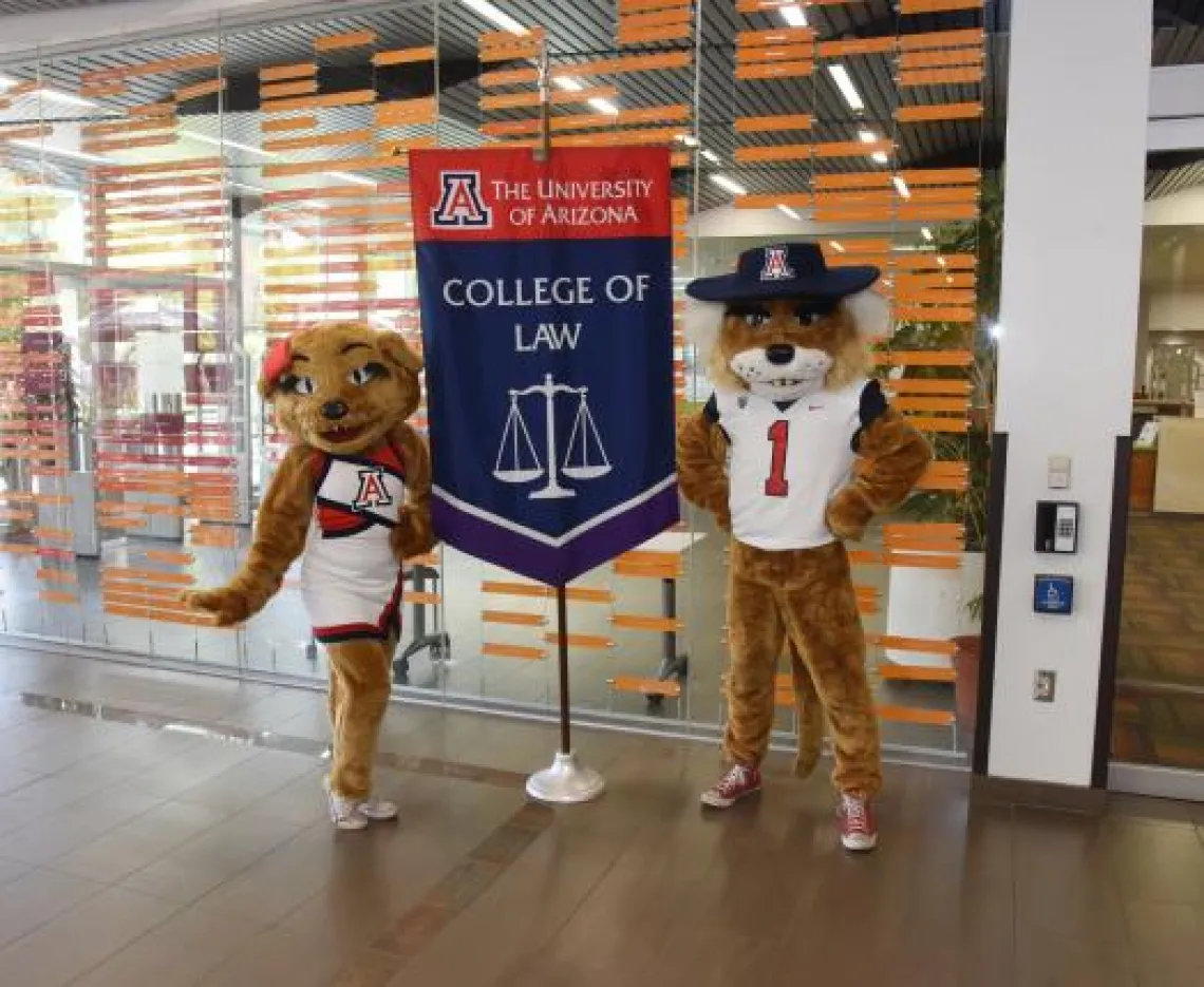 Wilbur and Wilma by College of Law sign