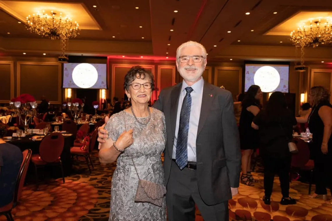 Couple posing for photo