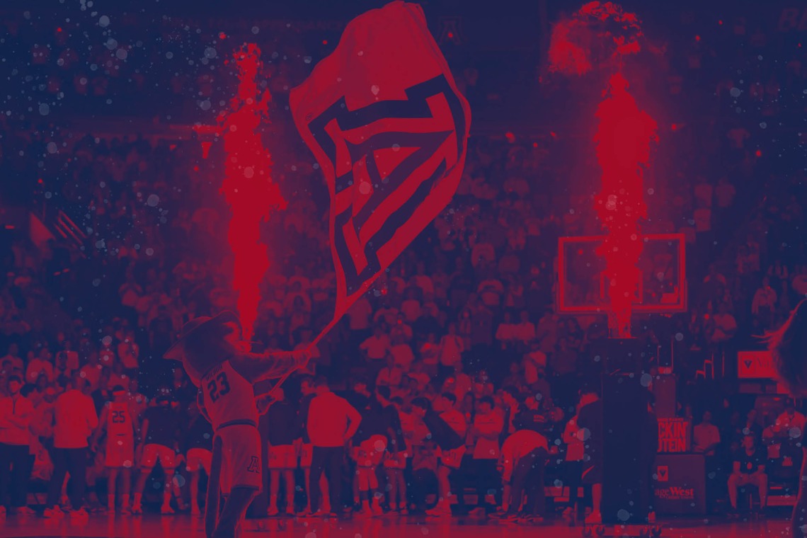 Red and blue graphic with Wilbur at basketball game