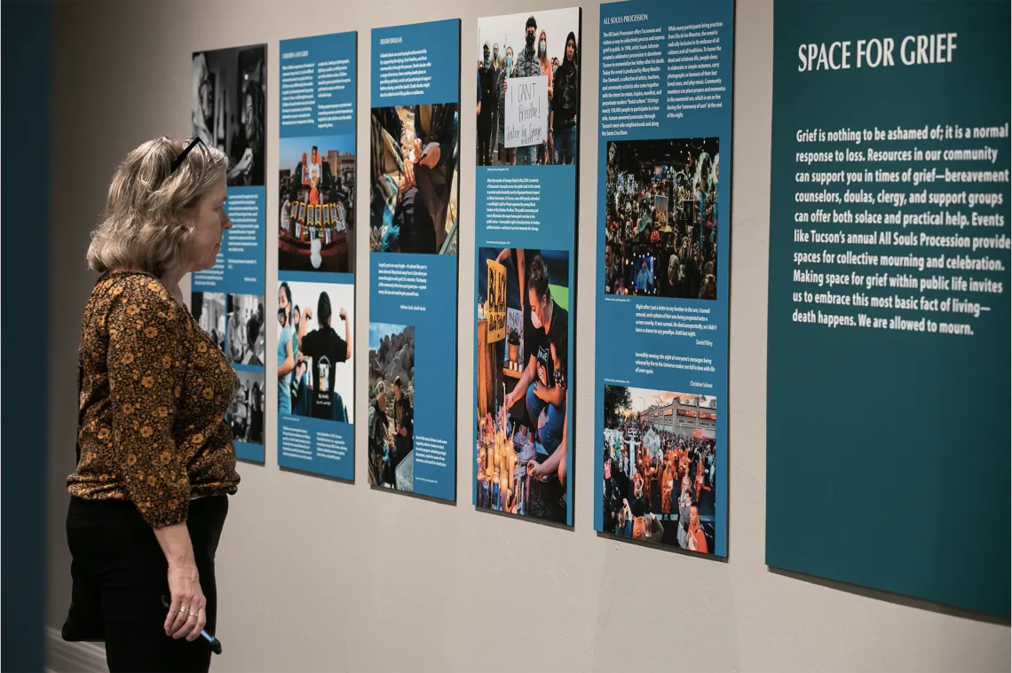 Woman looks at exhibit