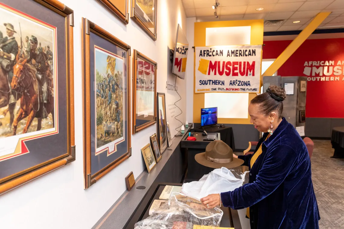 A photograph of guests learning at the African American Museum of Southern Arizona.