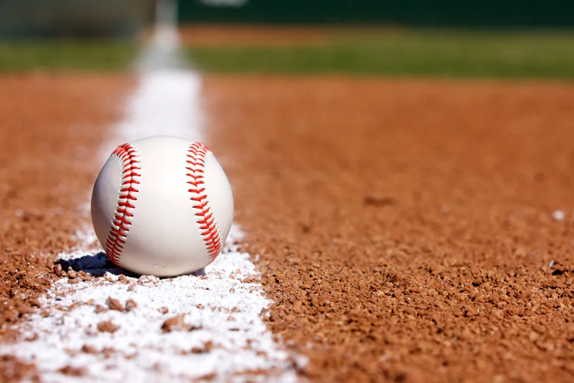 Photograph of baseball on field