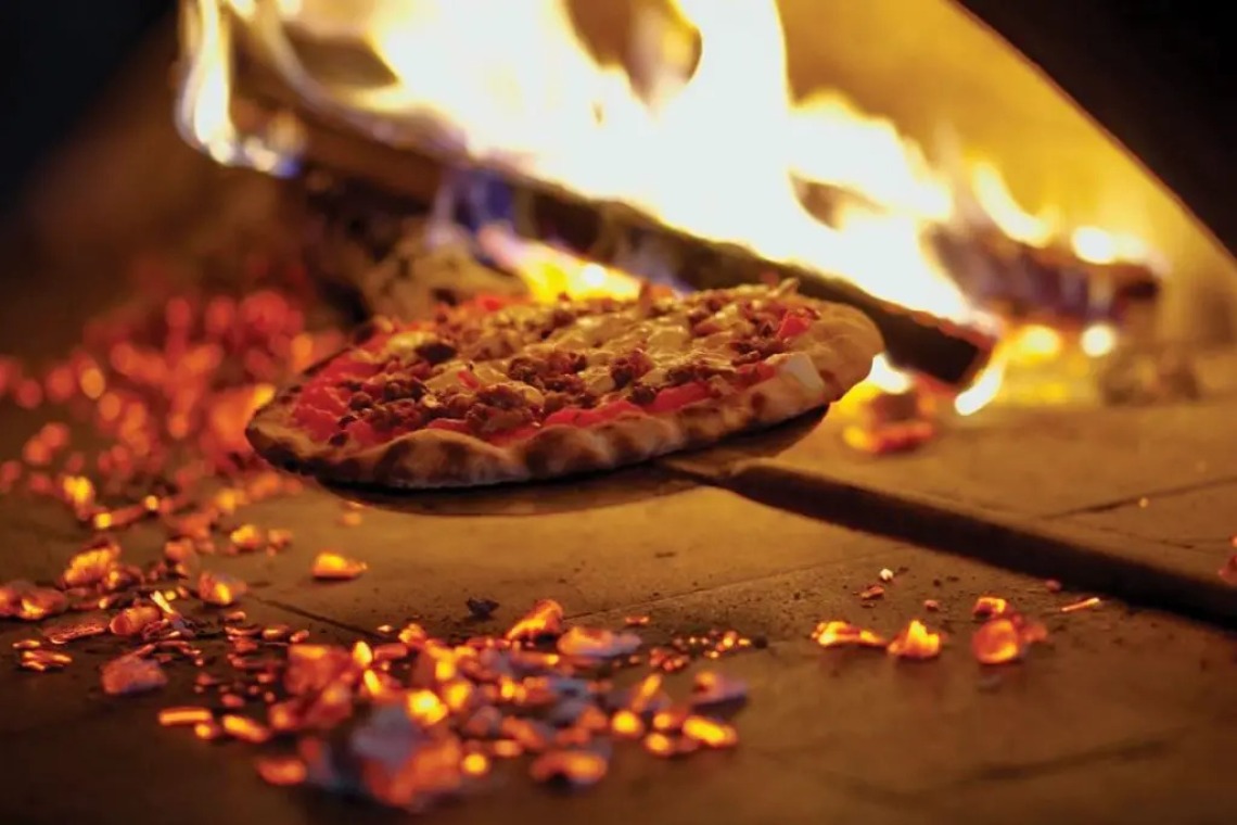 A photograph of a pizza in an oven at BonFire Craft Kitchen and Tap House 