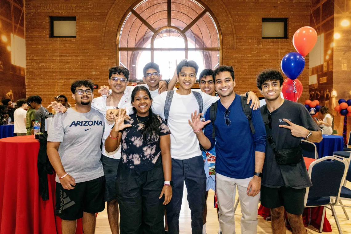 Students posing at luncheon