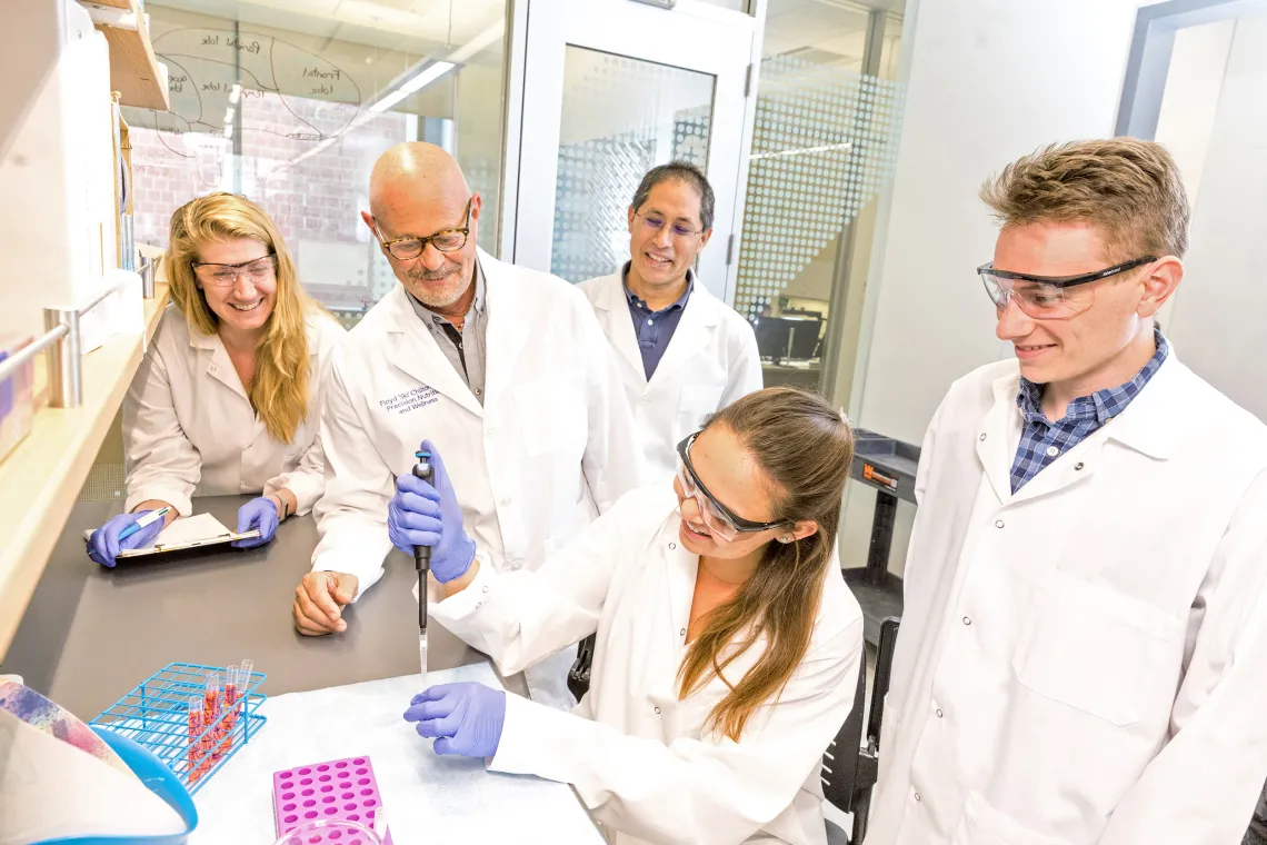 A photograph of BIO5 researchers in a lab