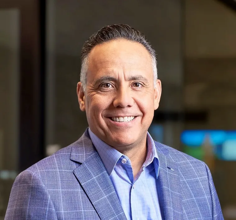 Portrait of man in business attire with soft focus background