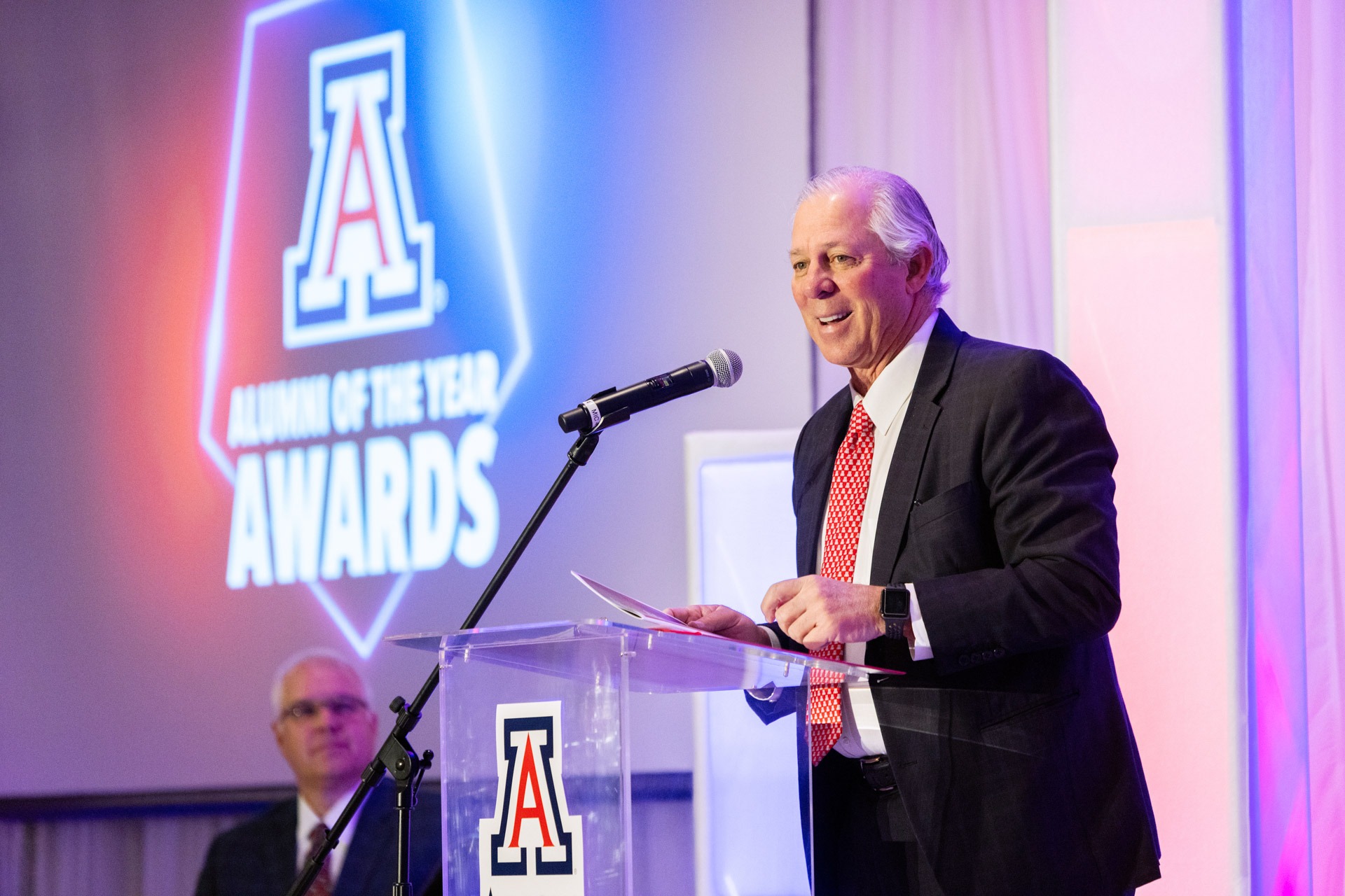 A photograph of University of Arizona President Robert C. Robbins, M.D. at the Alumni of the Year Awards.