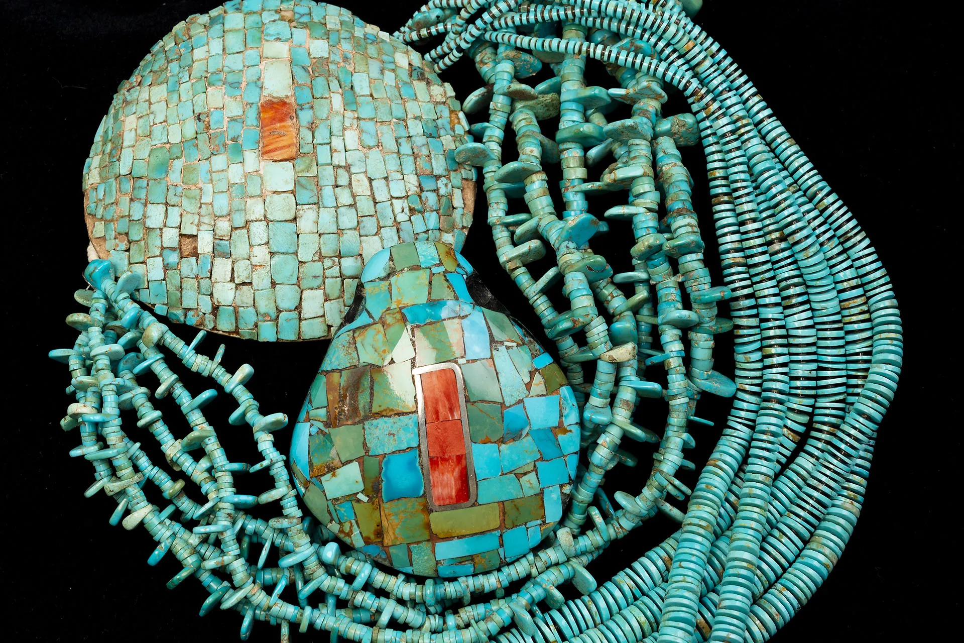 A photograph of turquoise jewlery