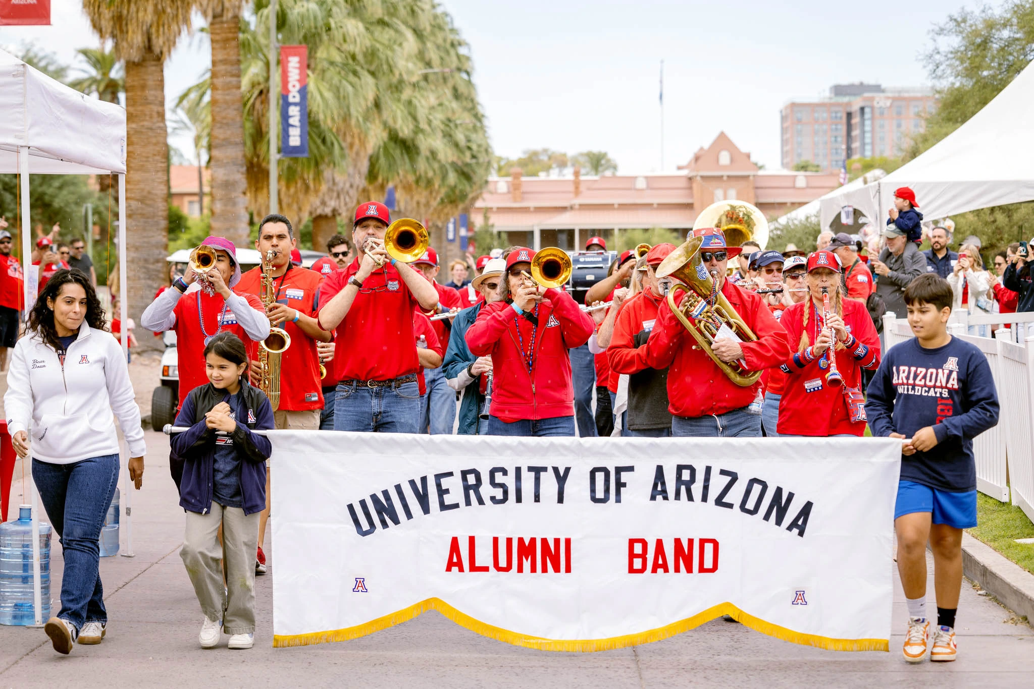 The University of Arizona Alumni Band playing down Old Main