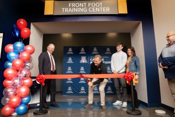A photograph of the ribbon-cutting for the Front Foot Training Center