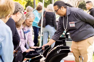 A photograph of visitors at the exhibit on opening day 