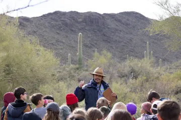 Camp Cooper’s instructor Isaac Silva talking to campers