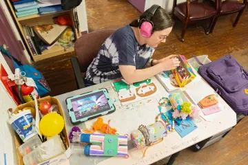 Image of Abigail Love creating art.