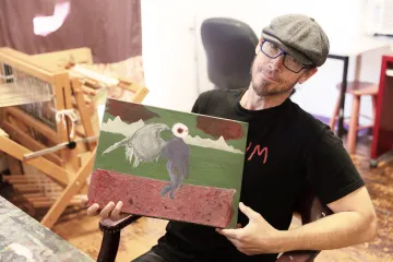 Image of Jon Green with his artwork