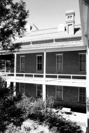 A photograph of Old Main with a missing finial.