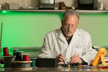 A photograph of a scientist working in a laboratory 