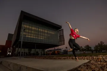 Dancer outside the School of Dance