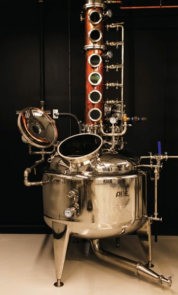 A photograph of a machine used to create gin